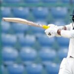 Ranji Trophy 2025–26: Sanat Sangwan’s Hundred Saves Delhi From Blushes Against Arch-Rivals Mumbai The Ranji Trophy 2025–26 served up a classic domestic cricket storyline when Delhi vs Mumbai—India’s most storied first-class rivalry—opened with a gritty, pressure-soaked day in Mumbai. Delhi were in deep trouble, sliding towards a modest total, before Sanat Sangwan produced a fighting 118 that rescued them from complete embarrassment and helped them reach 221 all out. But even Sangwan’s resolve couldn’t fully blunt Mumbai’s bowling force. Seamers and spinners hunted in packs, with Mohit Awasthi leading the charge through a decisive five-wicket haul. As if the rivalry and intensity weren’t enough, the day carried an unusual visual: players were reportedly forced to wear masks for a period due to dust and pollution from construction near the venue, creating a talking point that extended beyond the boundary rope. This blog breaks down the match day in a simple, SEO-friendly way—covering the score, key performances, turning points, and what it means for the rest of the game and Delhi’s season. Delhi vs Mumbai Ranji Trophy 2025–26: Match Snapshot Match: Mumbai vs Delhi, Elite Group (Ranji Trophy 2025–26) Venue: Sharad Pawar Cricket Academy BKC, Mumbai Delhi 1st Innings: 221 all out (76.4 overs) Top scorer: Sanat Sangwan 118 (218 balls, 11 fours, 2 sixes) Best Mumbai bowler: Mohit Awasthi 5/62 (16.4 overs) Close of Day 1: Mumbai 13/1 (as reported), with play ending slightly early due to poor light Why This Rivalry Always Feels Bigger Than a Group Match When Delhi and Mumbai share a Ranji Trophy field, it rarely feels like “just another fixture.” This is the rivalry that has produced decades of India’s domestic legends, intense sessions, and momentum swings that often define entire seasons. The 2025–26 meeting carried its own context: both teams had something to prove in a competitive group where every first-innings lead, every batting bonus, and every session matters. Even a single day can shape qualification calculations and confidence levels. And on Day 1, it was Delhi’s young opener Sanat Sangwan who stood tall when the rest of the batting line looked shaky. Conditions and the “Masks” Moment: A Rare Domestic Talking Point One of the most striking elements from Day 1 wasn’t a cover drive or a wicket celebration—it was the air quality concern. Reports indicated dust and pollution from construction activity near the venue caused discomfort, and Mumbai fielders were seen wearing masks for around 30 minutes in the final session. The same report mentioned the AQI at BKC was 156 (listed as “unhealthy”) later in the evening, and that Mumbai’s team management wrote to the association regarding the issue. In domestic cricket, where players already grind through long days and tough spells, such conditions can add an extra layer of challenge—especially for fast bowlers working hard and fielders sprinting repeatedly. While the match remained the main story, this was a reminder that modern cricket increasingly intersects with off-field realities too. Delhi’s Batting Story: One Hundred, Many Wickets Delhi’s innings ended at 221, which tells you the overall picture: they struggled, lost wickets regularly, and needed one major innings to avoid a very low total. That one major innings came from Sanat Sangwan. Sanat Sangwan’s 118: A Proper First-Class Rescue Act Sangwan’s hundred wasn’t about fireworks. It was about survival, discipline, and timing his aggression. According to the scorecard and match reporting, he scored 118 off 218 balls, hitting 11 fours and 2 sixes—numbers that scream “I batted time, I fought, and I held the innings together.” In a rivalry match, against an attack that kept making breakthroughs, he played the kind of innings that teammates remember for a long time—because it gives bowlers something to defend. Also notable: this was reported as his third century of the season, suggesting Sangwan isn’t just having a one-off day—he’s building a consistent Ranji campaign. The Support Acts: Starts That Didn’t Become Partnerships Delhi did get contributions around Sangwan, but not enough to build a large total. The Cricbuzz scorecard shows Vaibhav Kandpal made 32, while others fell in small clusters, and Delhi’s innings never truly stabilized beyond Sangwan’s presence. This is usually the difference between 221 and 300+: in first-class cricket, you need at least two batters to go big, or a solid middle-order partnership. Delhi mostly got one. Mohit Awasthi’s Five-For: The Spell That Tilted the Day Mumbai’s Way If Sangwan was the reason Delhi reached 221, then Mohit Awasthi was a key reason they didn’t go beyond it. Awasthi finished Day 1 with 5/62 in 16.4 overs, a spell that underlined Mumbai’s ability to seize control once the innings entered the later phase. In a match like Delhi vs Mumbai, a five-wicket haul is not just statistics—it’s a statement. The Indian Express match report also highlighted that Awasthi’s five-for anchored Mumbai’s effort while Sangwan’s ton prevented a complete Delhi collapse. Why This Five-For Matters in Context Keeps the total below 250, a psychological win on most wickets. Ensures Mumbai has a strong chance to secure a first-innings lead, which can become decisive in Ranji formats. Forces Delhi to rely heavily on their bowlers to claw back control. In Ranji Trophy cricket, the first innings often sets the tone for the whole match. Mumbai’s bowlers ensured that tone favored them. The Innings Timeline: How Delhi Slipped, Then Stabilized, Then Fell The live commentary updates suggested Sangwan was already well set by tea, reaching 104 at the break while Delhi were 172/5. That indicates Delhi were still in trouble but had a chance to stretch the total if the lower order held. However, the fact that they ended on 221 all out confirms that Mumbai cleaned up the tail efficiently, and the last phase of the innings belonged to the bowlers. This is a familiar Ranji pattern: top-order batter scores a hundred, middle-order offers brief support, and then a sharp bowling unit finishes things quickly once the set batter is removed. Mumbai’s Reply: Early Movement, Early Wicket, Early Advantage At stumps, Mumbai were reported at 13/1, with play ending a few minutes early due to poor light. That single wicket, although small on paper, matters because: It puts Delhi on the back foot immediately after being bowled out. It signals Mumbai’s plan: bat calmly, build a lead, and let the pitch and pressure do the rest. Day 2 becomes crucial because if Mumbai’s top order settles and builds a 150–200 run partnership, Delhi may find themselves chasing the game hard. Key Takeaways From Day 1 1) Sanat Sangwan Looks Like Delhi’s Season Anchor A hundred in a rivalry game under pressure is a strong indicator of temperament. With reports calling it his third century of the season, Sangwan’s form could be one of Delhi’s biggest positives this year. 2) Delhi’s Middle Order Needs More Weight Delhi cannot repeatedly rely on one batter to rescue them. Against a team like Mumbai, you need at least two meaningful partnerships to post a commanding total. 3) Mumbai’s Bowling Depth Still Wins Sessions The combination of regular wickets and a five-for from Awasthi shows Mumbai can still dominate with the ball in traditional Ranji fashion. 4) Conditions Might Become a Storyline The mask incident due to dust/pollution is unusual and could affect stamina and comfort if the situation continues across days. What Delhi Need to Do From Here If Delhi want to stay alive in this match, they need to win one big session early on Day 2. The best case scenario for them is: Get Mumbai 3–4 down quickly. Keep the first-innings lead within reach. Force Mumbai’s middle order to rebuild under pressure. If Mumbai reach 150/2 or 180/3, Delhi’s bowlers will start feeling the weight of a low first-innings total. What Mumbai Will Aim For Next Mumbai’s blueprint is straightforward: Bat time. Build a lead of 80–120+. Put Delhi back under scoreboard pressure in the second innings. In Ranji cricket, once Mumbai get ahead, they are usually very hard to pull back—because their bowling unit can attack and control the game in long spells. Why This Match Is Still Open (Despite Delhi Being Bowled Out for 221) Yes, 221 is not a massive score. But in first-class cricket, matches can flip quickly if: the pitch starts helping bowlers, there is early moisture or movement, or a team loses 2–3 wickets quickly and panic spreads. A rivalry match also carries emotional swings. One burst of wickets can bring Delhi right back into it. Simple FAQs (SEO-Friendly) What was Delhi’s score in the first innings vs Mumbai? Delhi were bowled out for 221 in 76.4 overs. Who scored the century for Delhi? Sanat Sangwan scored 118. Who took five wickets for Mumbai? Mohit Awasthi took 5/62. Why were players wearing masks during the match? Reports said dust and pollution from nearby construction led to some players wearing masks for around 30 minutes. What was Mumbai’s score at stumps on Day 1? Mumbai were reported at 13/1, with play ending slightly early due to poor light. Conclusion Ranji Trophy 2025–26: Delhi vs Mumbai began with a familiar pattern—Mumbai dominating with the ball, Delhi fighting through one brave batter, and the rivalry delivering drama even on a single day. Sanat Sangwan’s 118 was the innings that saved Delhi from a far worse situation, proving his growing importance to the team’s campaign. But Mohit Awasthi’s five-for ensured Mumbai still won the day overall, keeping Delhi’s total to 221 and starting their own innings with an early advantage. With Mumbai at 13/1 at stumps, the match is set up for a crucial Day 2—where Delhi must strike early, and Mumbai will aim to build a commanding first-innings lead.